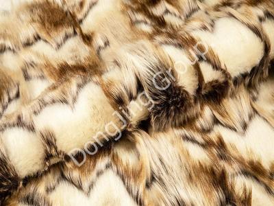 9W1150-Brown and white dyed pointed rabbit faux fur fabric