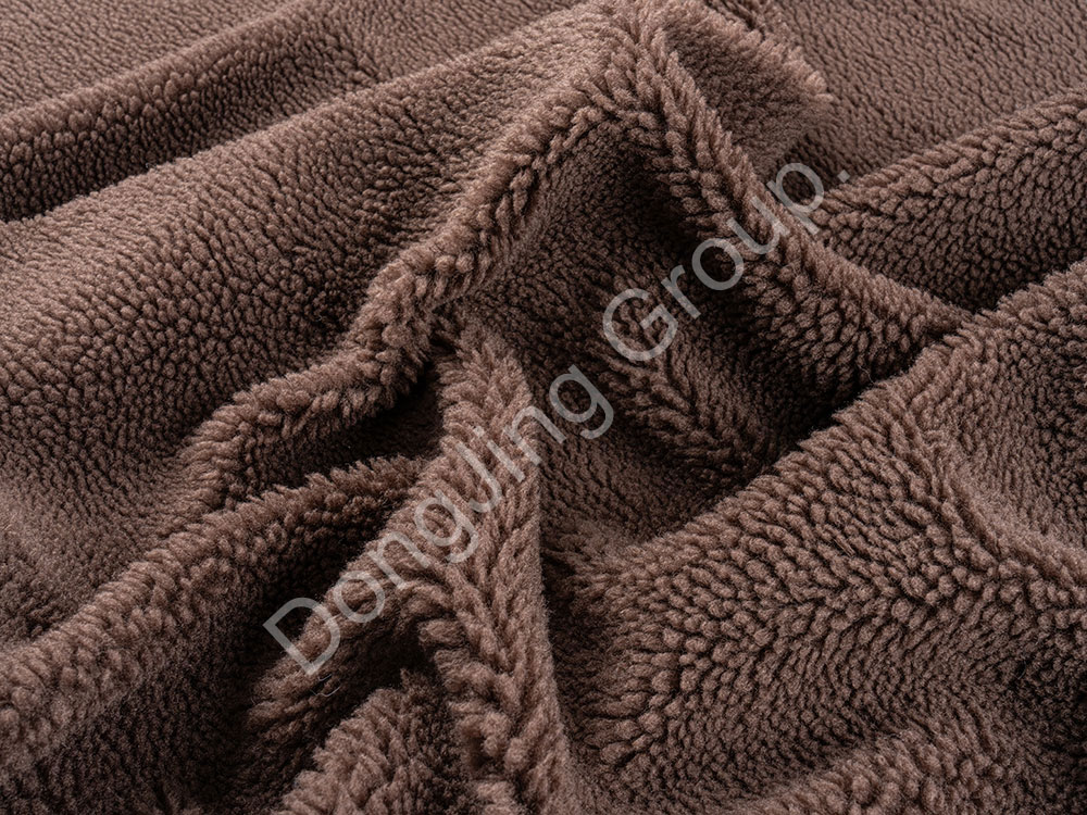 How to incorporate Coffee Rolling Ball Faux Fur Fabric into your daily wear?