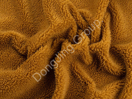 What should we pay attention to during the manufacturing and dyeing process of ginger brown composite rolling cloth faux fur fabric? 
