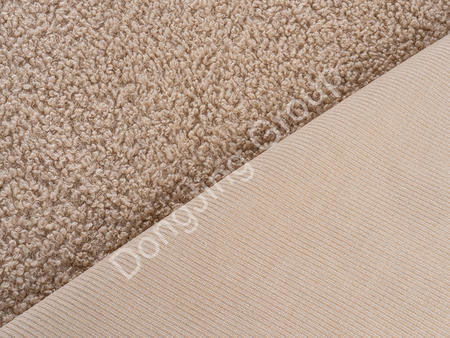 What is the environmental impact of using chenille beige faux fur fabric?