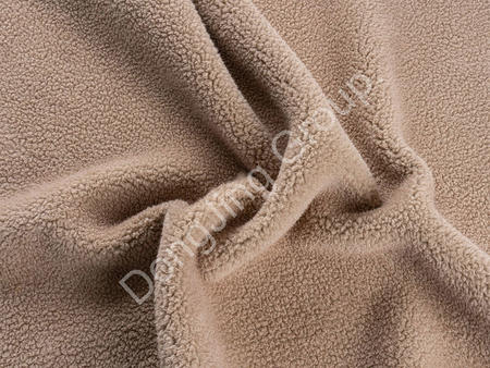 How is Imitation Suede Integrated Velvet Faux Fur Fabric Redefining Creative Possibilities in Modern Fashion Design?